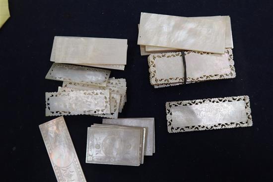 A quantity of Victorian mother of pearl gaming counters and a pair of opera glasses